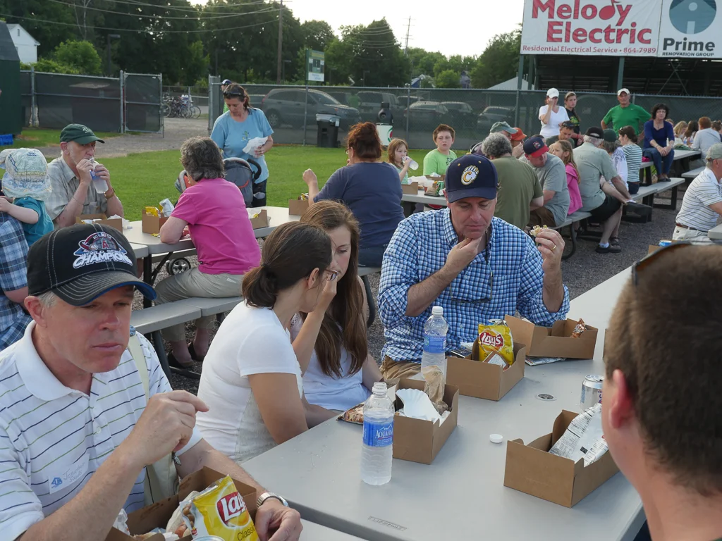 Faculty and families enjoying a barbecue