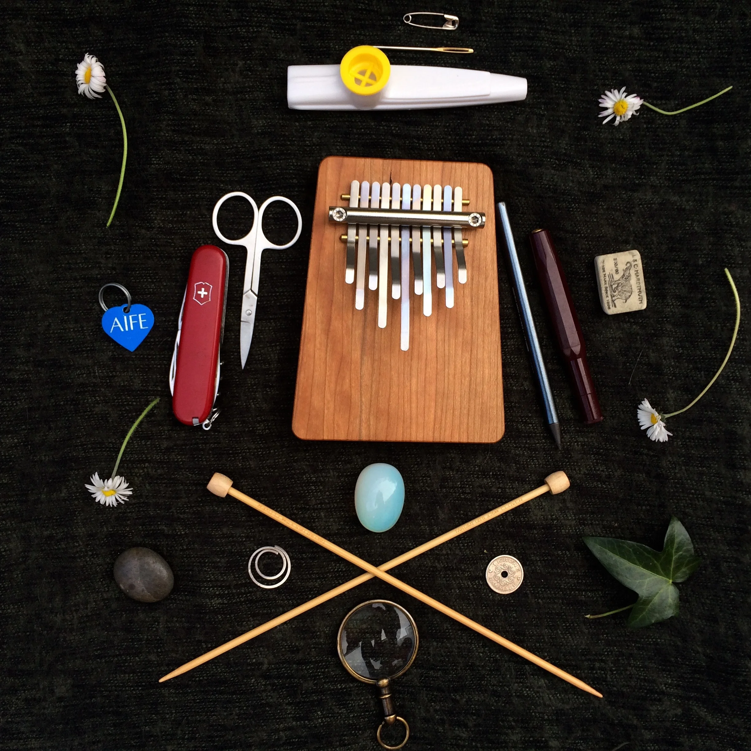 A sampling of some of the small items I keep in my backpack, many of which will be integral to the smallness exercises to come.&nbsp;