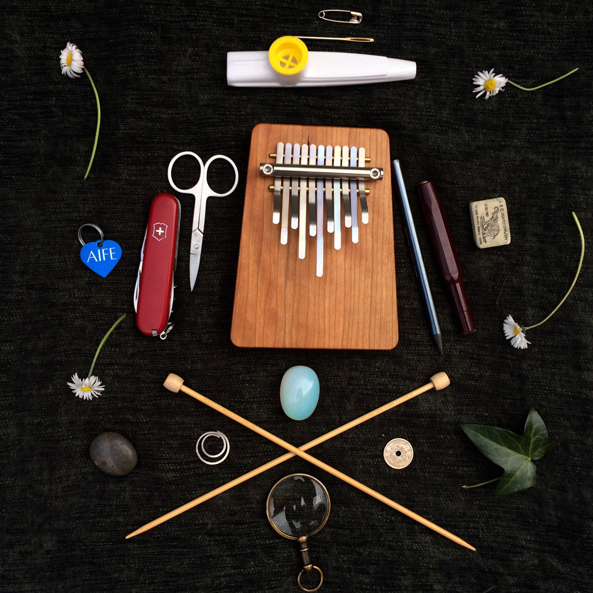 A sampling of some of the small items I keep in my backpack, many of which will be integral to the smallness exercises to come. 