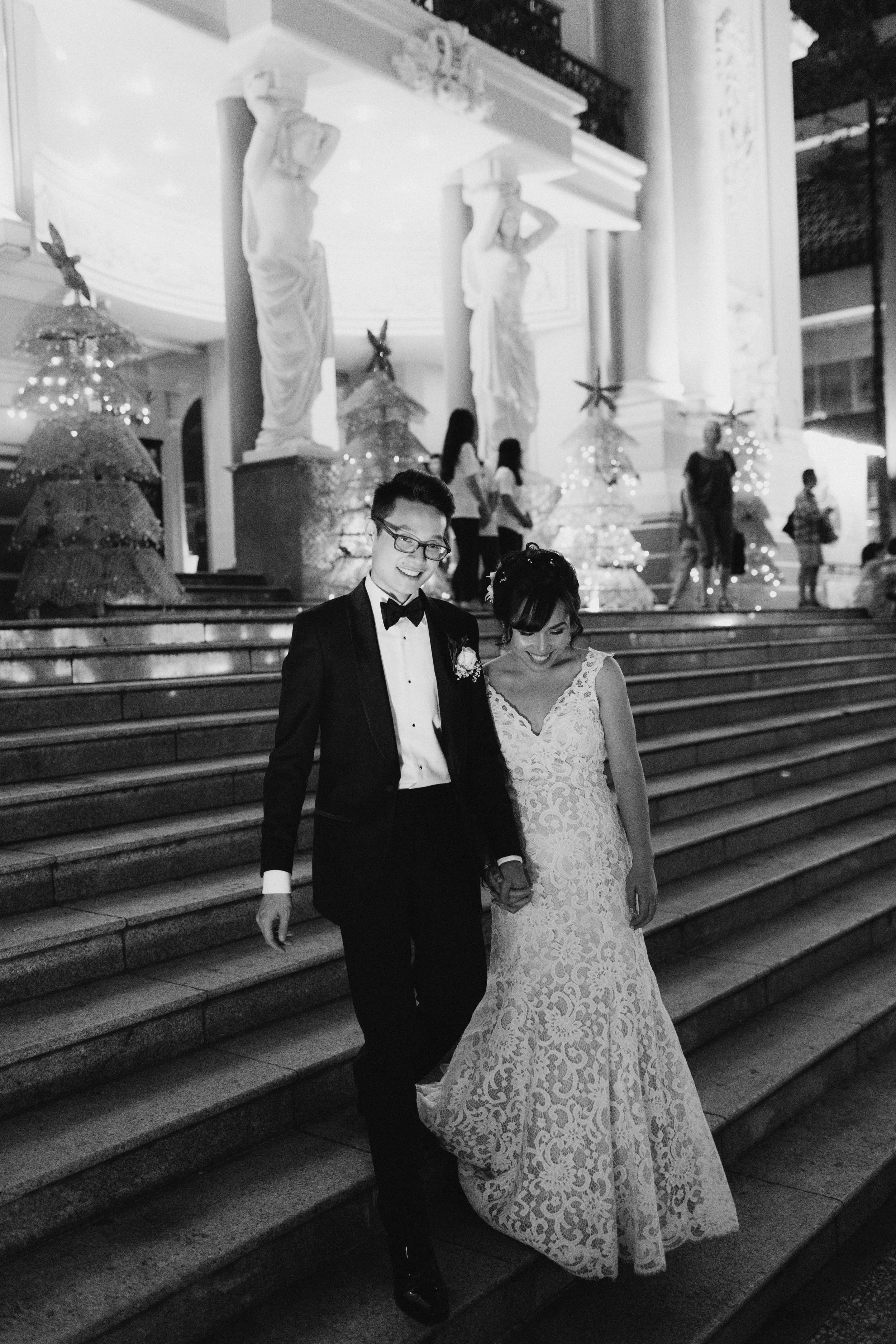 We took a 5 minute break from the reception to walk across the street to the Saigon Opera House. Han had already changed into her dancing flip flops.