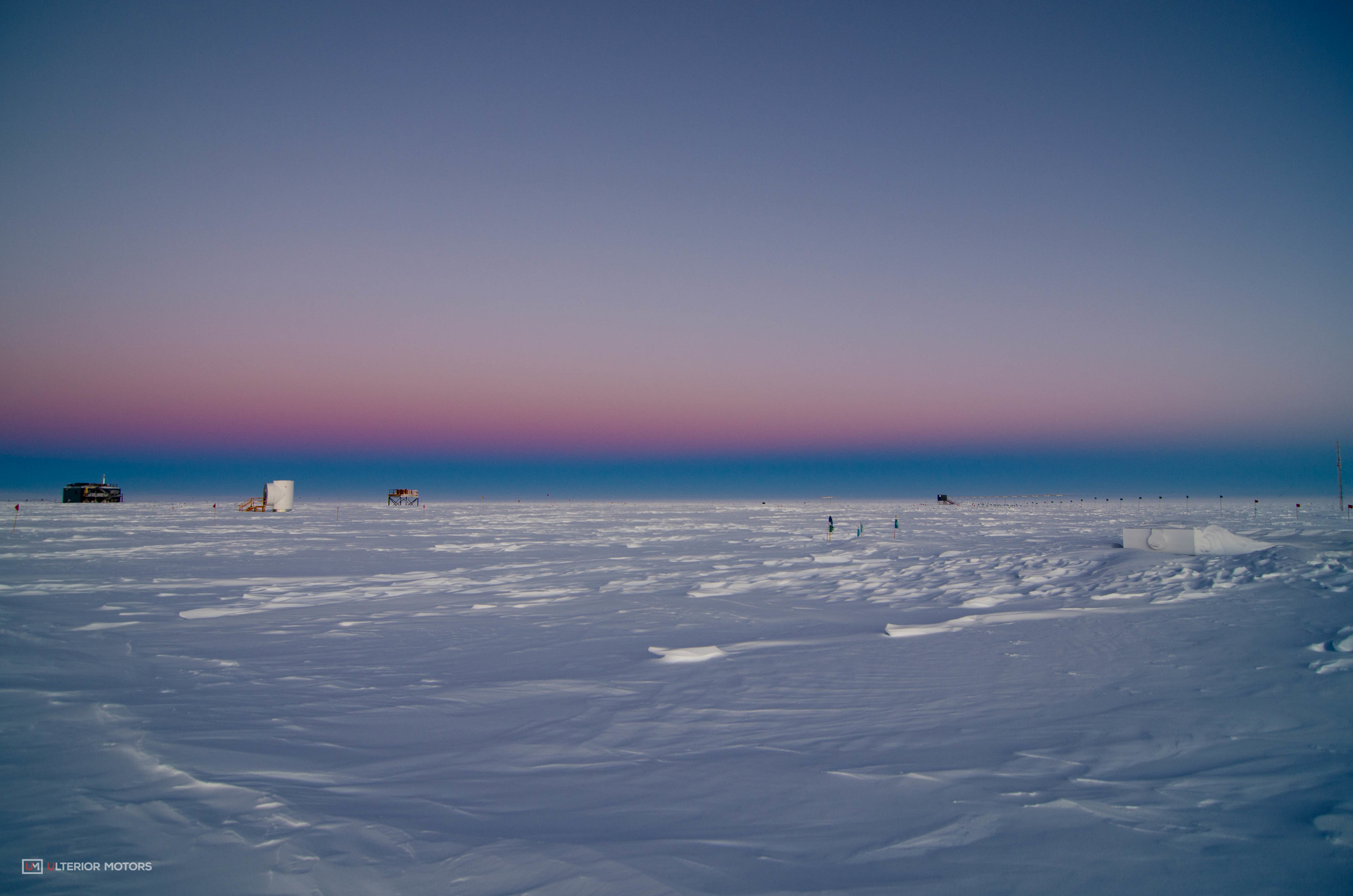 That dark blue band is the shadow of the earth on the atmosphere. The sun is 180 degrees behind the camera.