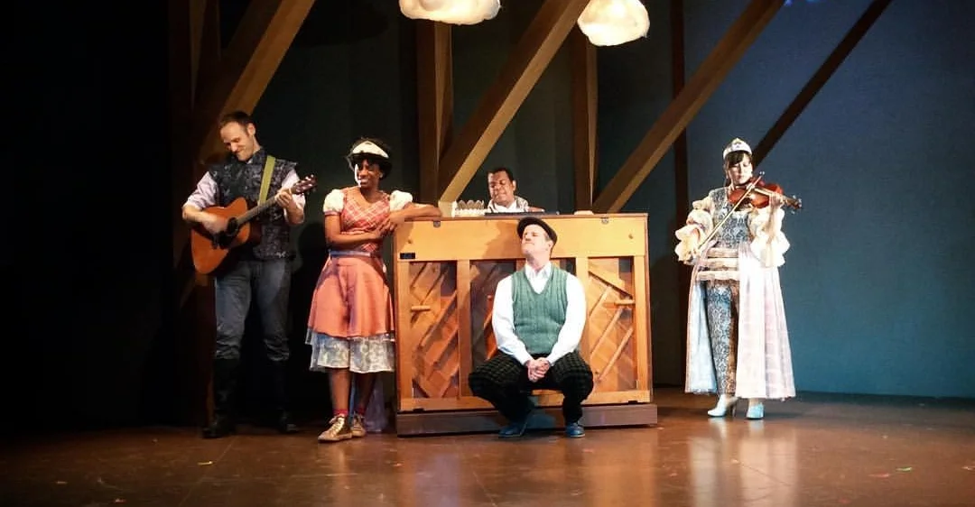 Full cast at piano.jpg