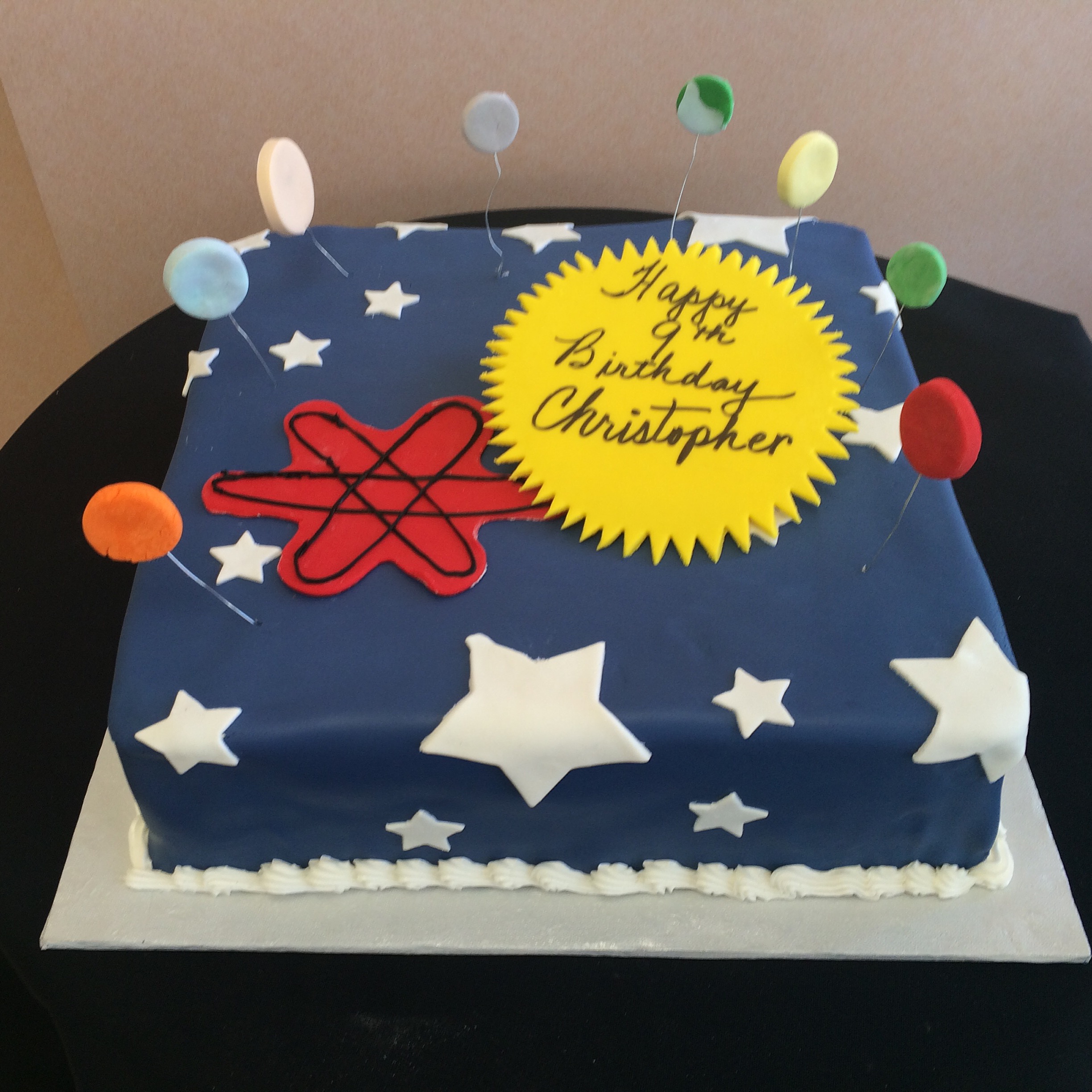 Navy Rolled Fondant Outerspace with floating planets .jpg