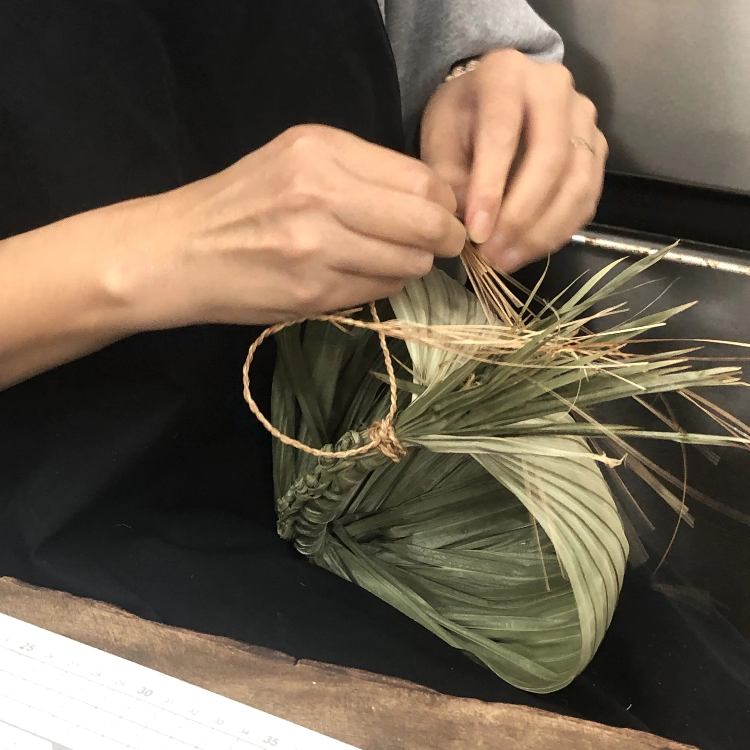 Making palm water carrier-image Charlotte Haywood.jpg