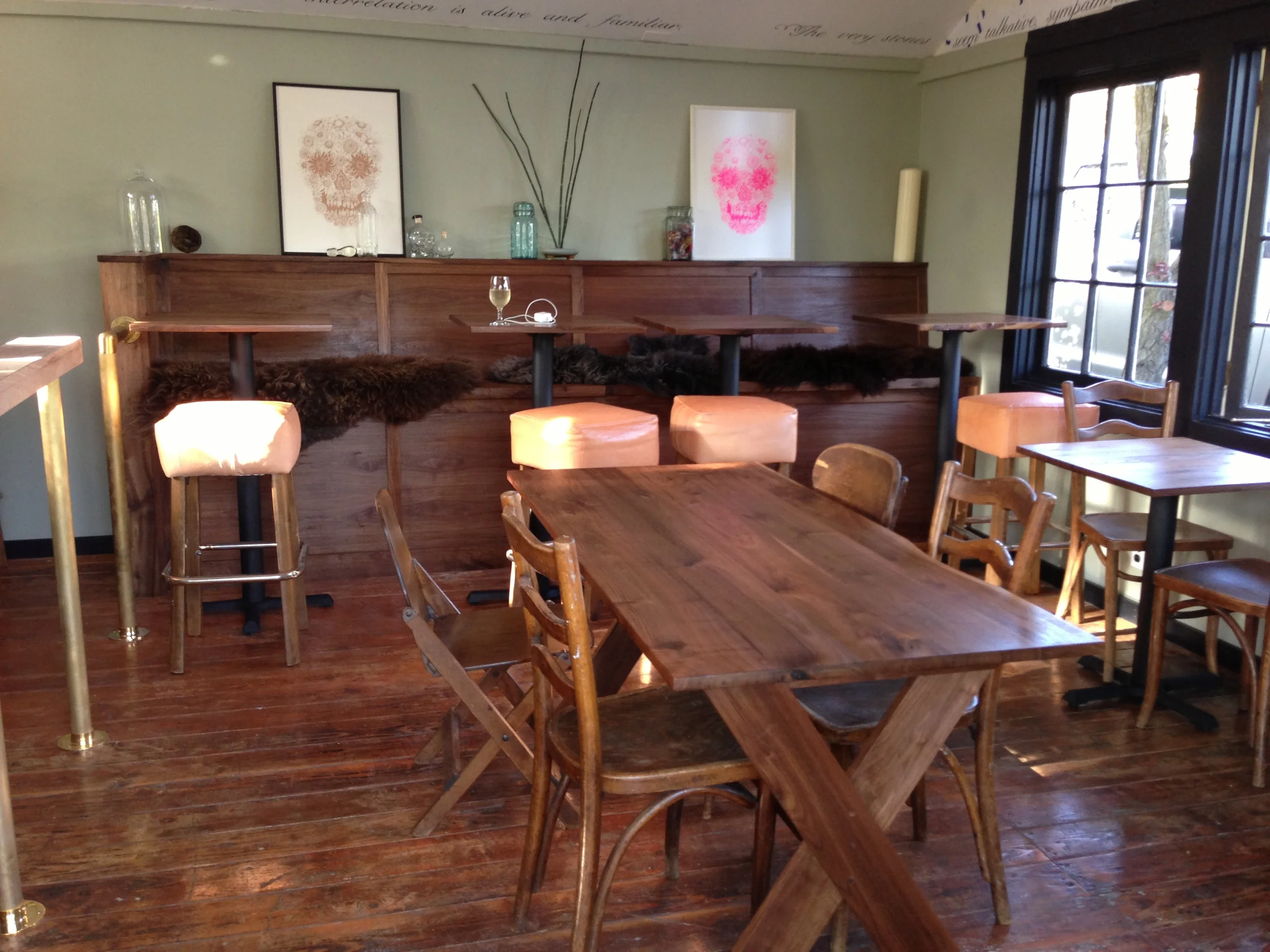  the center table is a refined take on a traditional picnic table.&nbsp; 