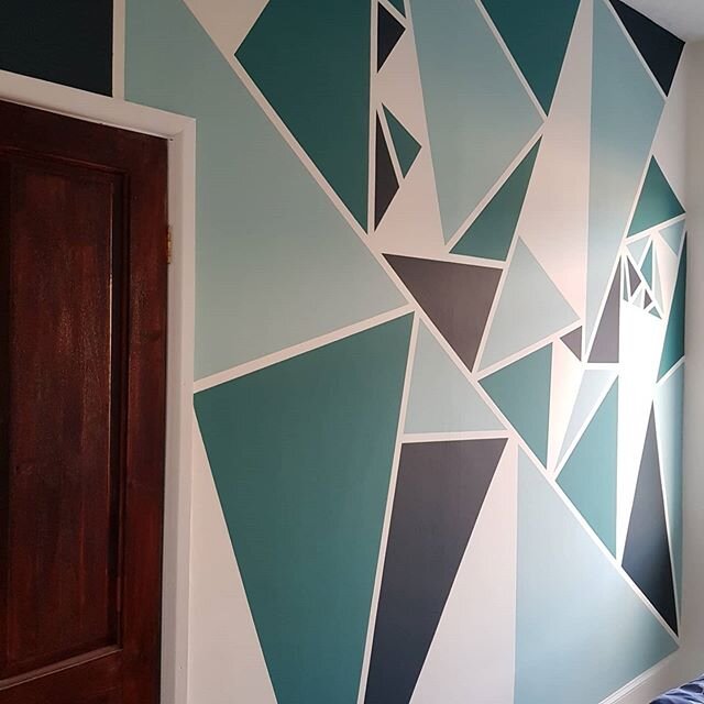 Just finished transforming a bedroom for a younger teenage boy in #Aspull #Wigan, the focal point of which is this cool #featurewall. Taking inspiration from a few images found online I marked out a template using tape and labelled each triangle befo