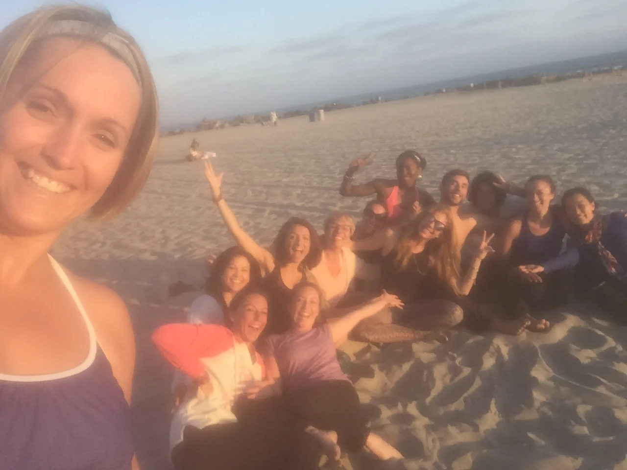 Break time for yoga on the beach with Christi Cristensen in San Diego!