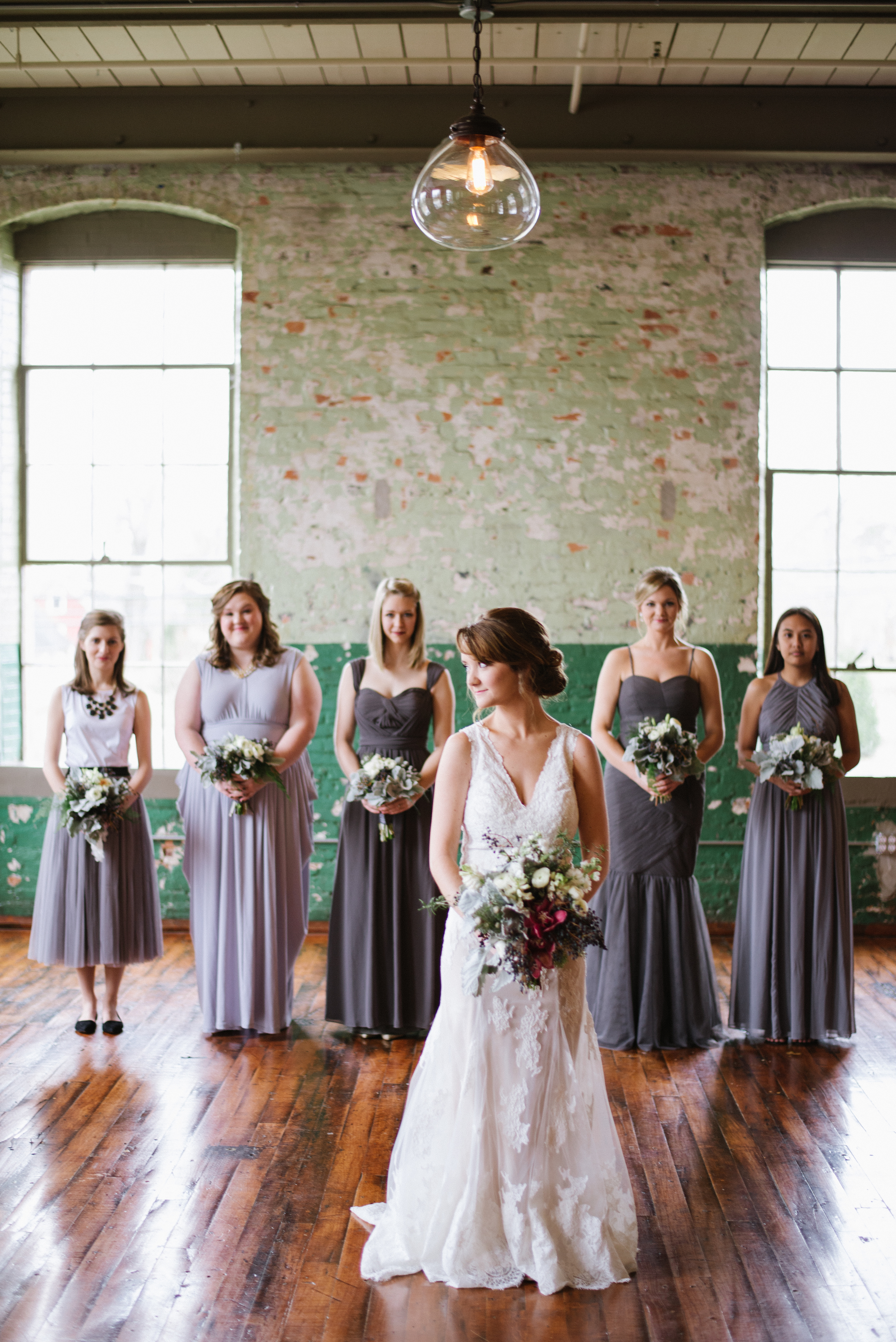 Mix and match bridesmaids dresses at an industrial-chic Georgia wedding. 