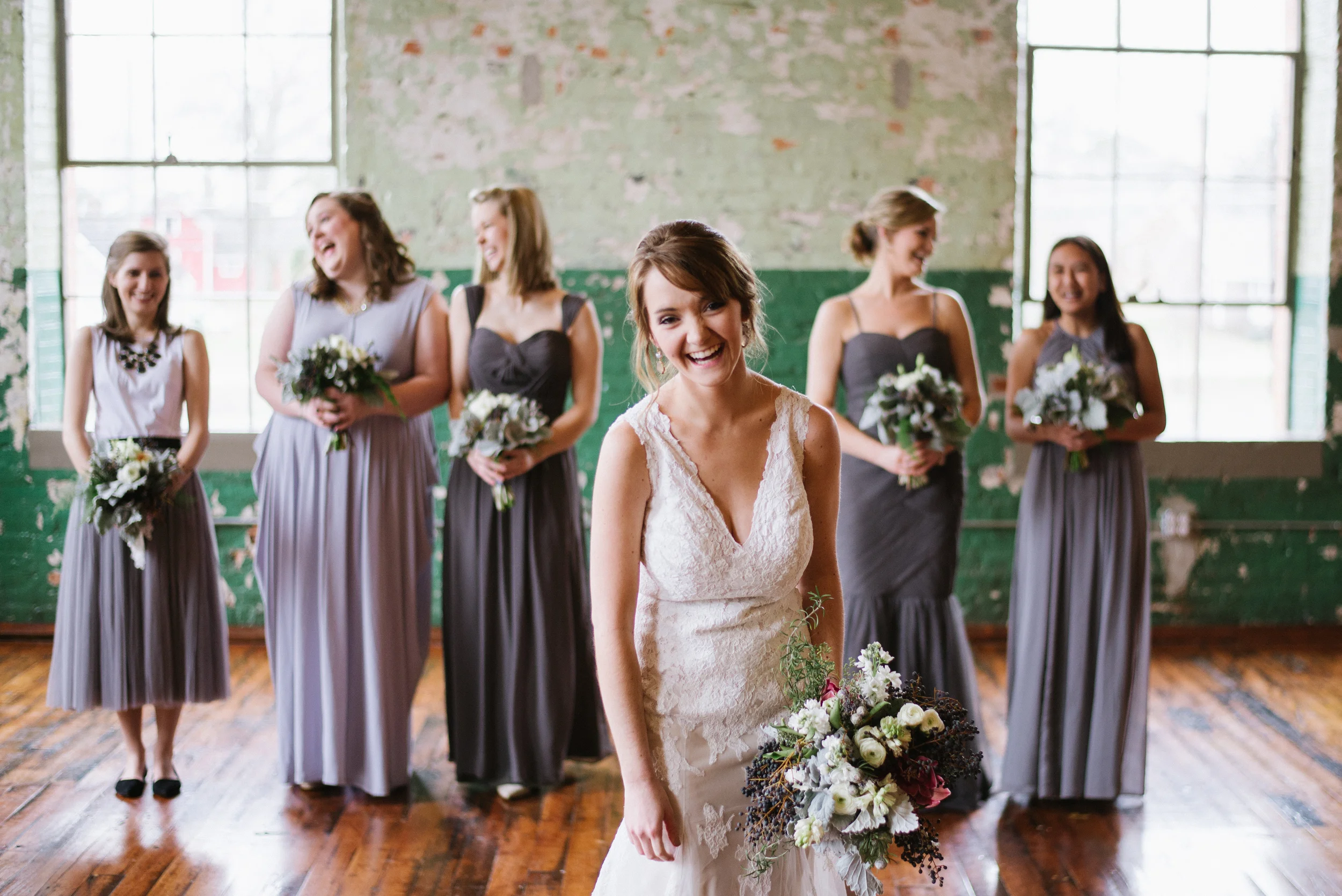 Mix and match gray bridesmaid dresses at an industrial-chic Georgia Wedding.