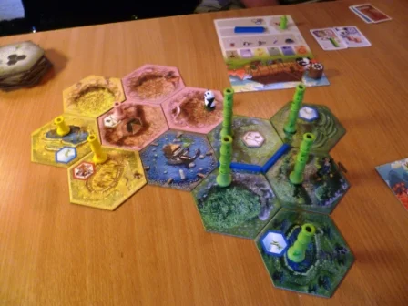 Takenoko - mid game showing three different land types and plenty of Green Bamboo growth