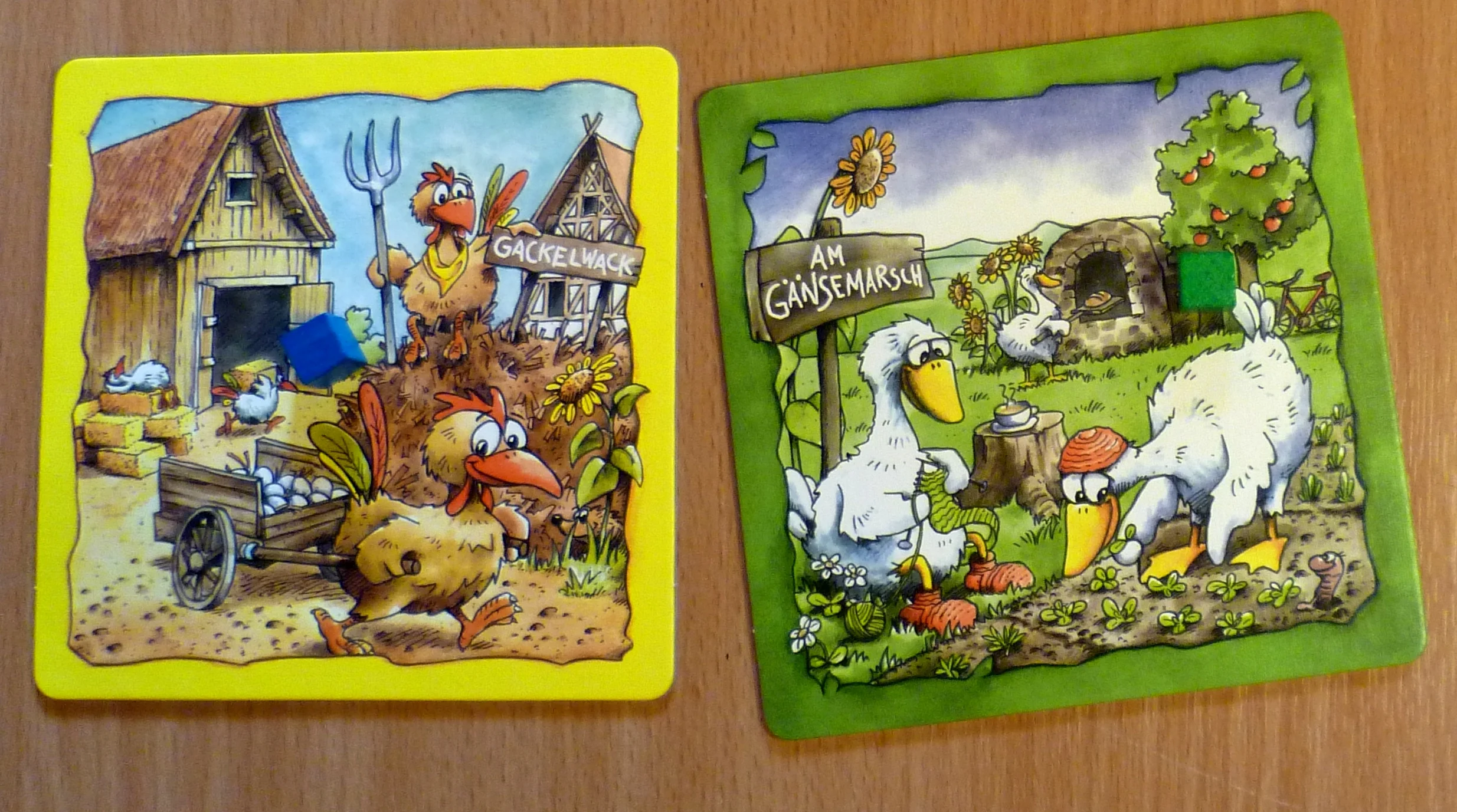 The chicken board with 1 Blue Corn (2 points) and the duck board with 1 Green Corn (1 point). 2 of the 6 boards to play to.