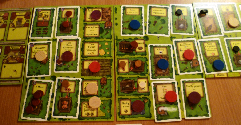 Agricola central board at games end with family members on them. some unused spaces still have materials on them
