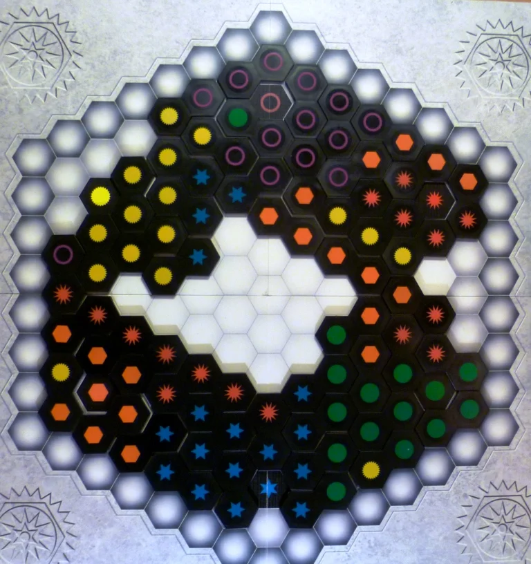 The board showing all the colours of the game, each colour has a unique symbol making this a colour-blind-friendly game