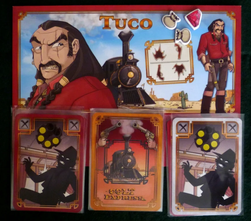 Player board, left stack is his gun showing 2 shots fired, middle is draw deck and right is discard with a hit from white on top. He has 1 gem and 2 cash bags.