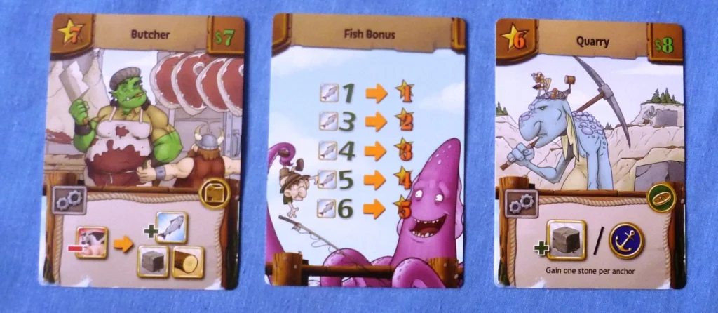 2 building cards in Harbour flanking a bonus victory point card