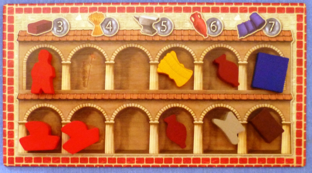 Player board in Concordia with goods stored in the warehouse