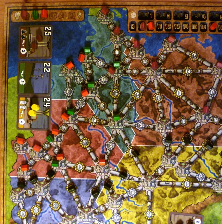 As this was a 3 player game only 3 areas are used, the black houses delinate the edge of the playing area.