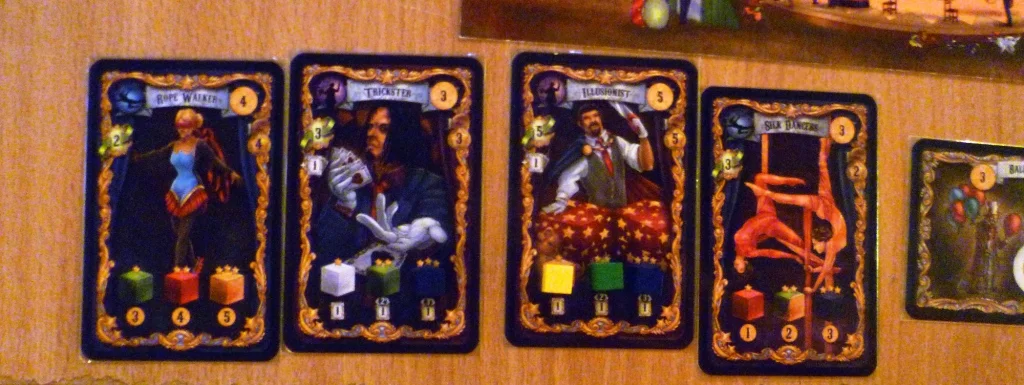One of the players performers showing the cubes required to fully equip them, the third card has been equipped.