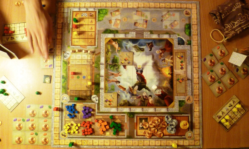 Fresco board at games end with Red winning and all bar 2 of the centre tiles "painted"