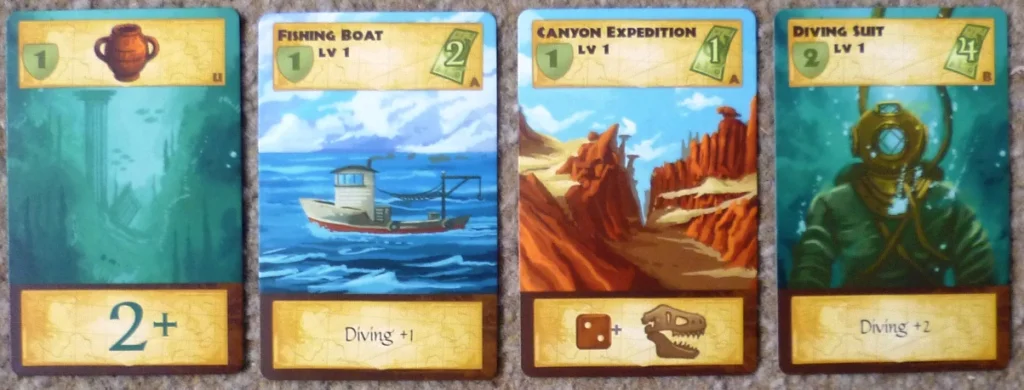 There are many different cards available depicted here are Treasure from a dive, 2 items (boat and diving suit) and an expedition.