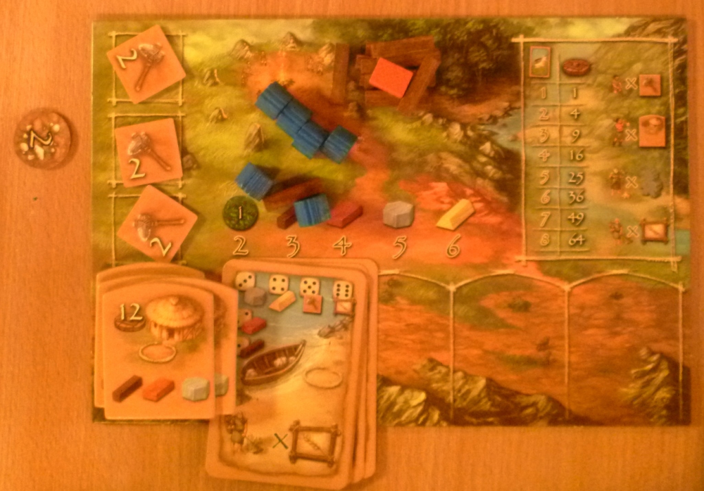 Player board with huts (bottom left) and bonus cards also tools (upper left on board) obtained from a special space on the main board