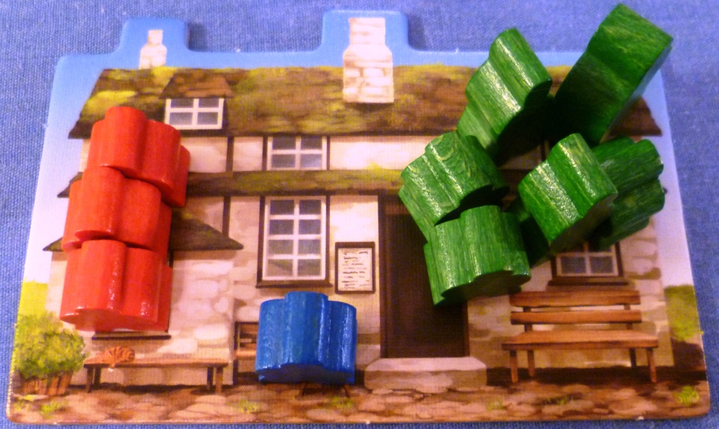 When an area is scored the meeples are sent to the pub where it costs a gold to release them.