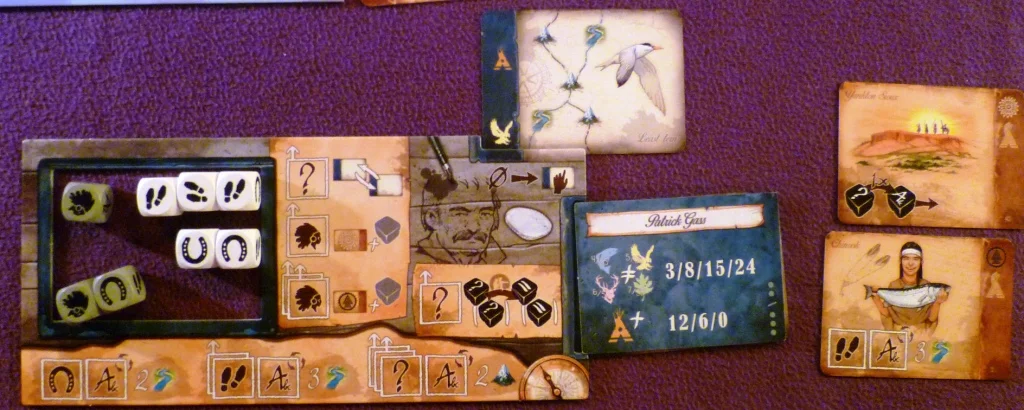 The white players dice (left), natives (right) and current travel card (top)