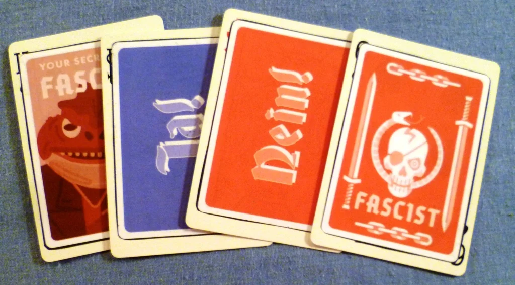 What is in the envelope - a player card, a yes vote and a no vote and finally a faction card