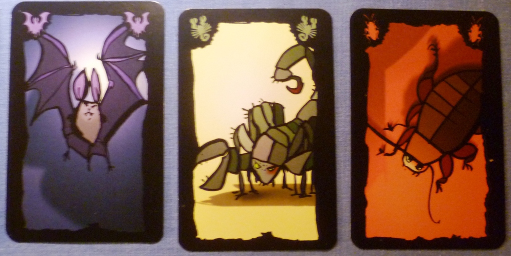 Three of the creatures in Cockroach Poker