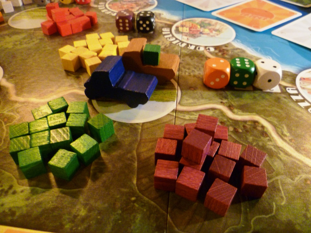 Two trucks at a farm with demand dice pictured behind