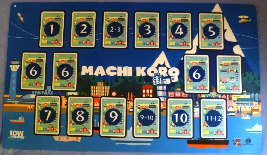 The deluxe version of Machi Koro comes with 2 expansions and a player mat
