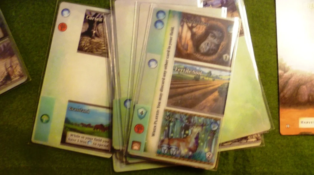 Mystic Vale sleeves containing 1, 2 or 3 card parts