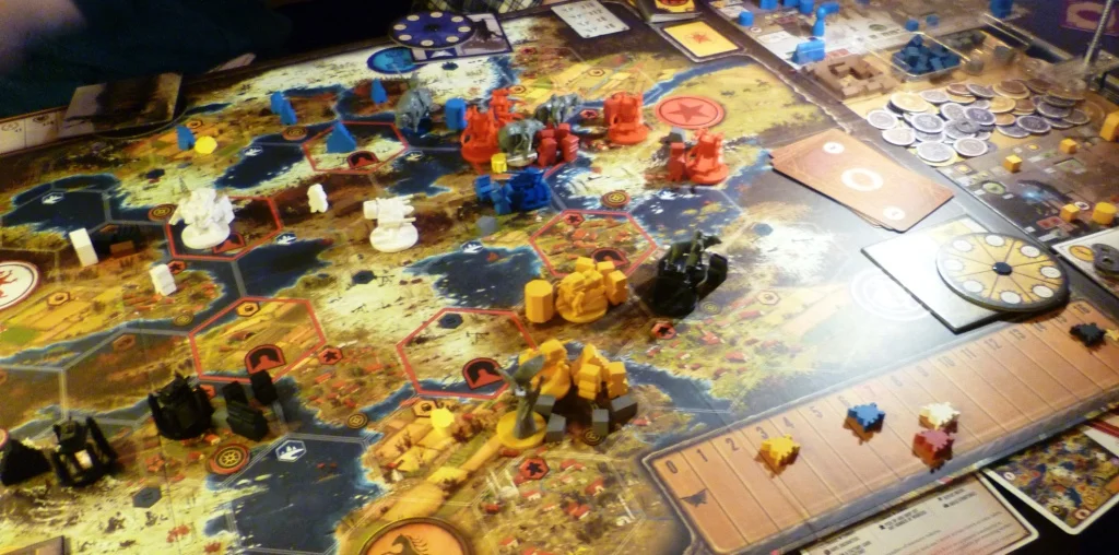 Scythe part-way into the game (early stages) the stars (bottom right) mark achievements attained by the players.