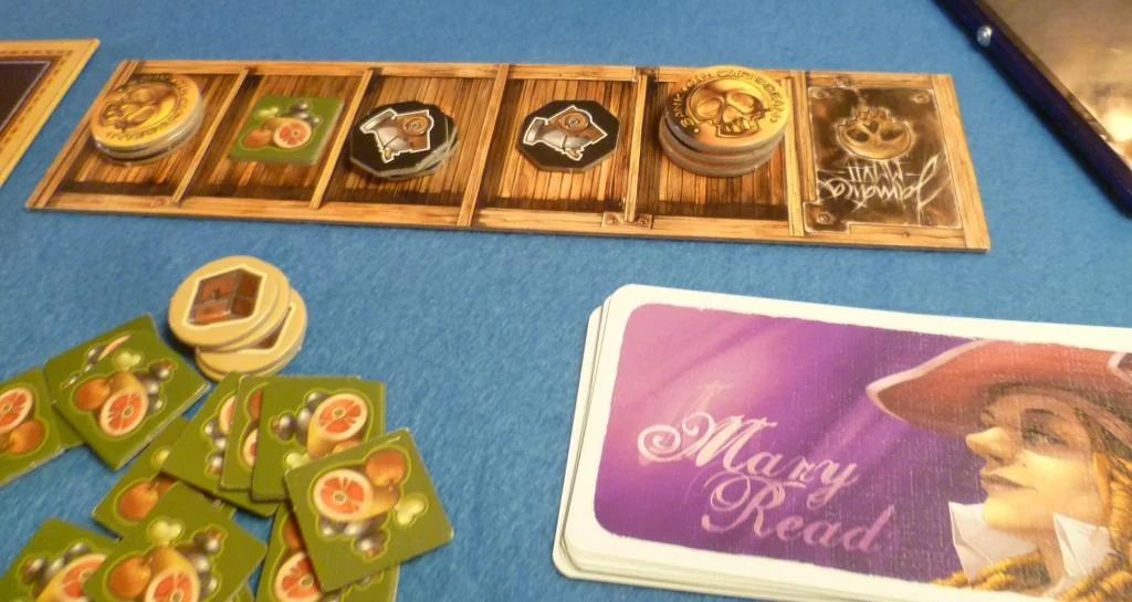 The board is this players holds in their ship, each hold can only contain one typr of good and must be all picked up at the same time.