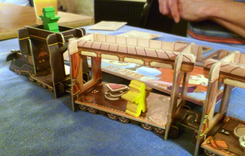 The Marshal near the front of the train guards a gem and some cash bags