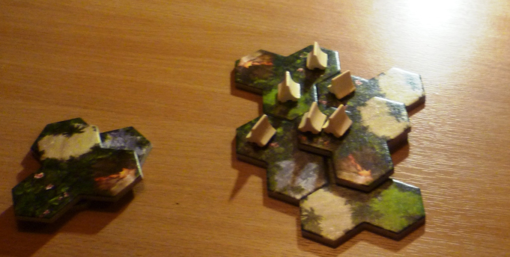 Taluva game in progress - though I have no idea what the other players were doing as white appears to have complete control.