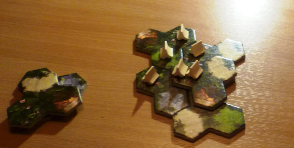 Taluva game in progress - though I have no idea what the other players were doing as white appears to have complete control.