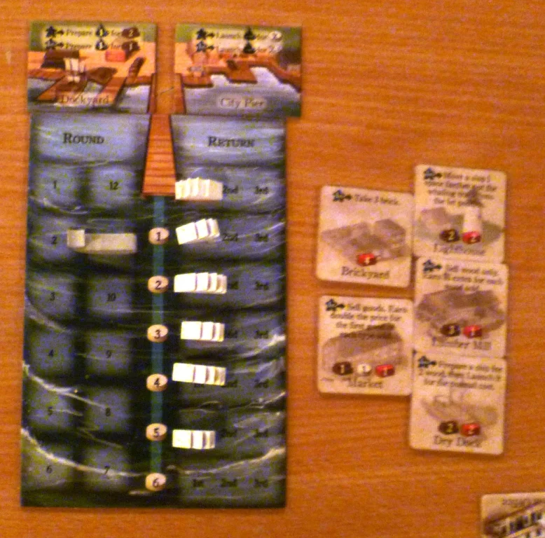 The whaling board showing we are on round 11, 6 ships at sea and to the right are 5 town tiles which can still be built.