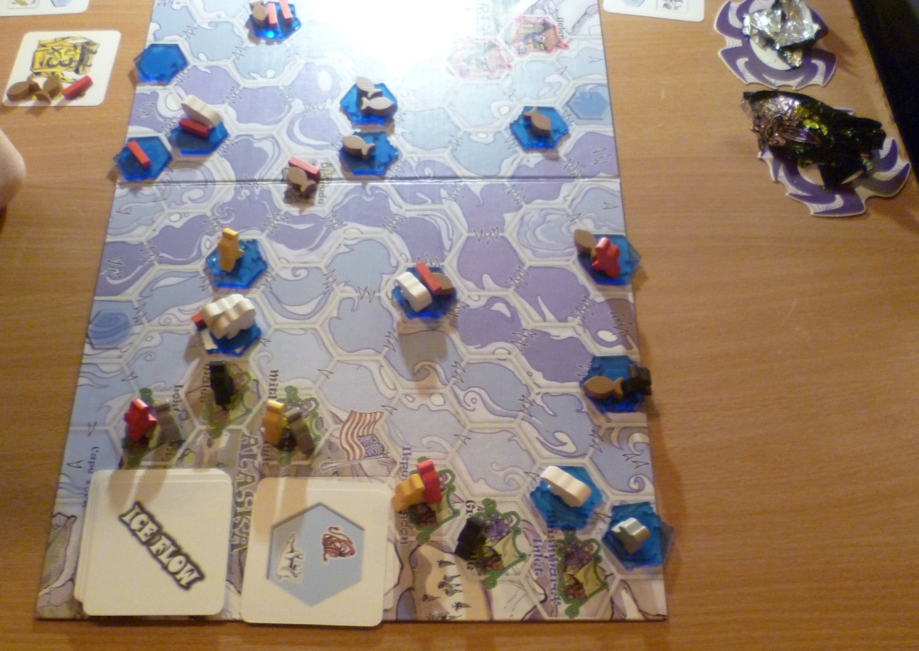Ice Flow at the beginning of the game, the dark blue pieces on the board are the ice flows