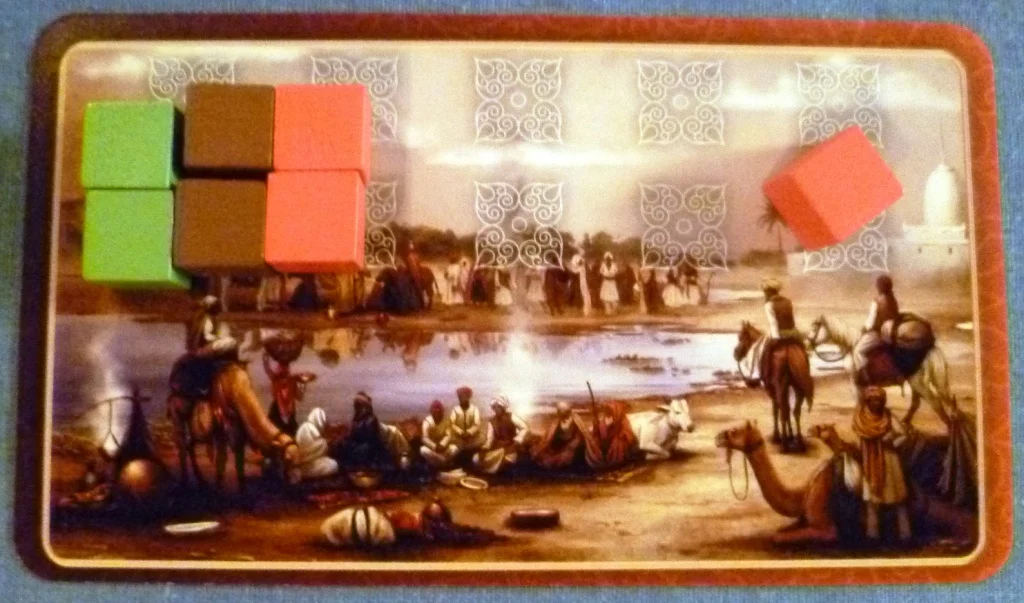 Each player has a caravan card to store their cubes on, each caravan has a limit of 10 cubes