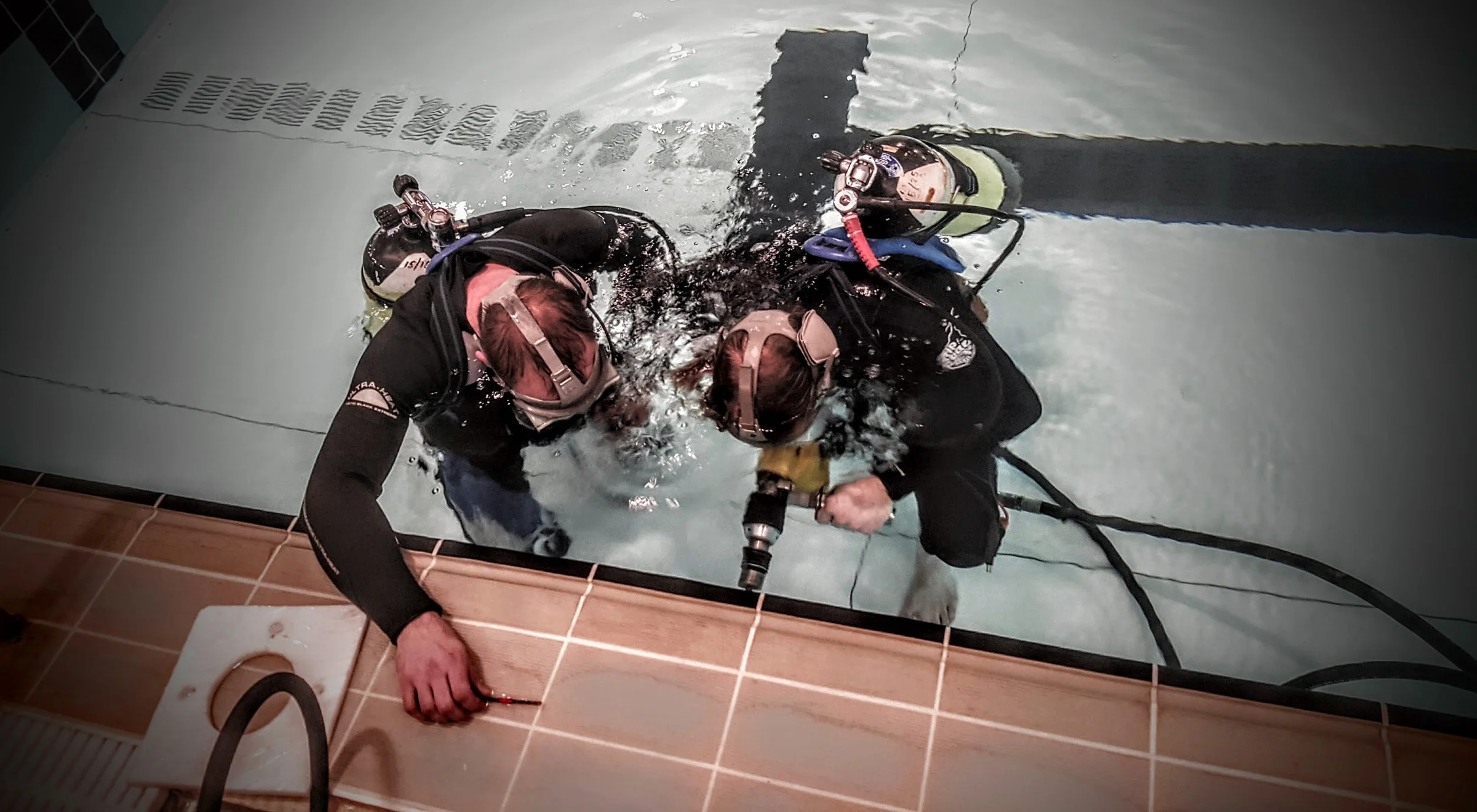 Preparing for Poolview core drilling of the tank.
