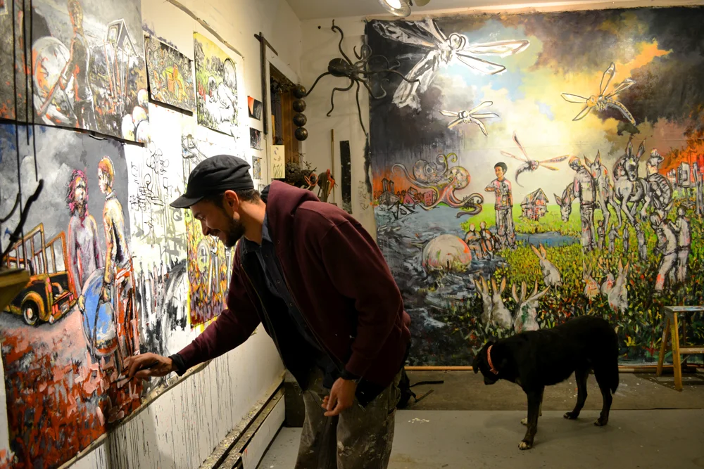 2013 MFA graduate Harlan Mack in his studio