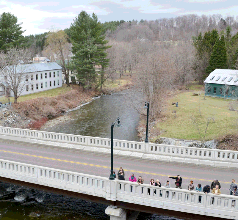 Artists & writers waving from the bridge across the Gihon River.