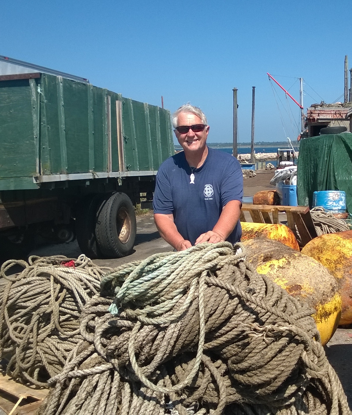 Keith at the New England fishing docks. So much line and so little time .