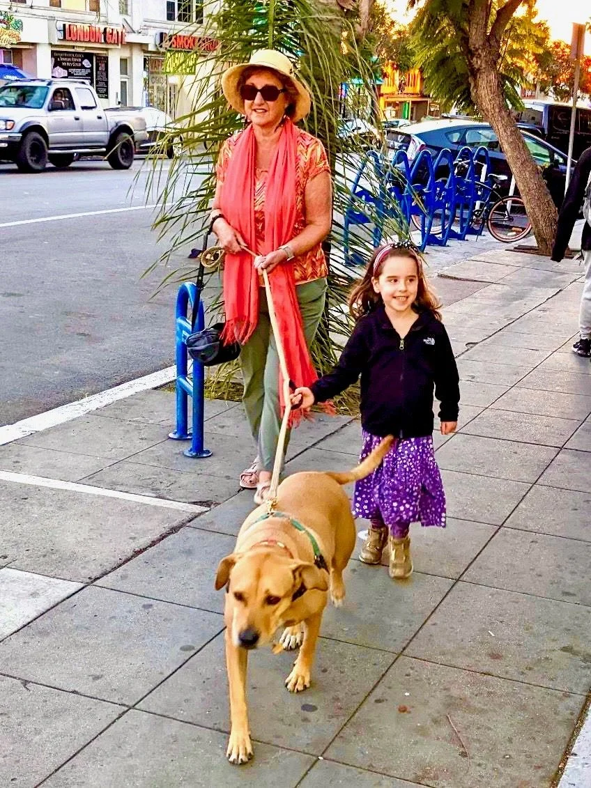 Brandy loves to help walk Lilly,
