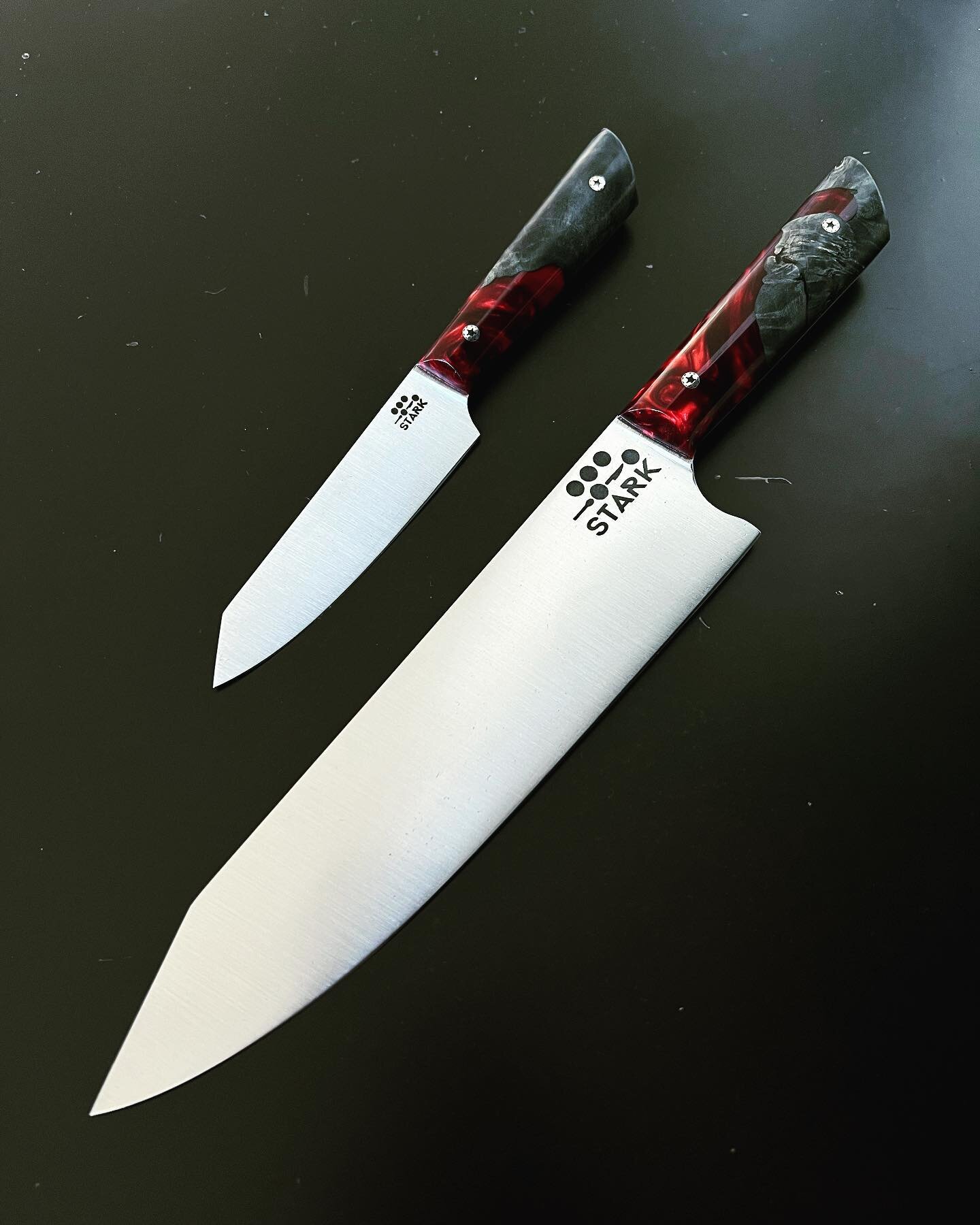 Any kitchen would benefit from having a reliable set like this! This custom order we just finished up consists of a paring knife and chef&rsquo;s knife, with matching ruby resin and dark dyed burl handles. A stunning pair!
&mdash;&mdash;&mdash;&mdash