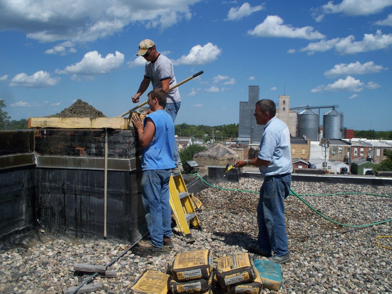 traill co c house capping the chimney.jpg