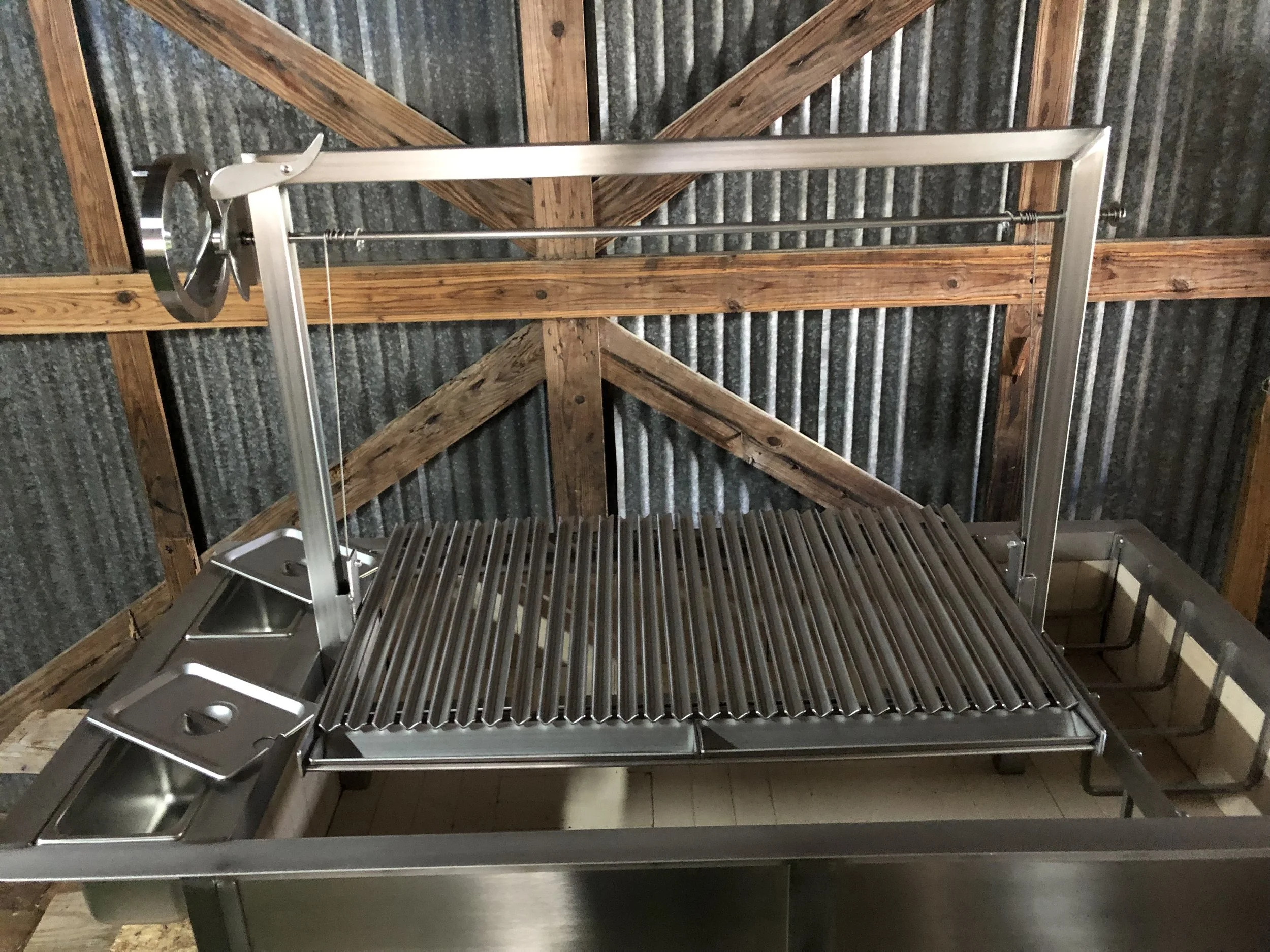 Argentine Asado style, standalone Firebox grill system in stainless steel