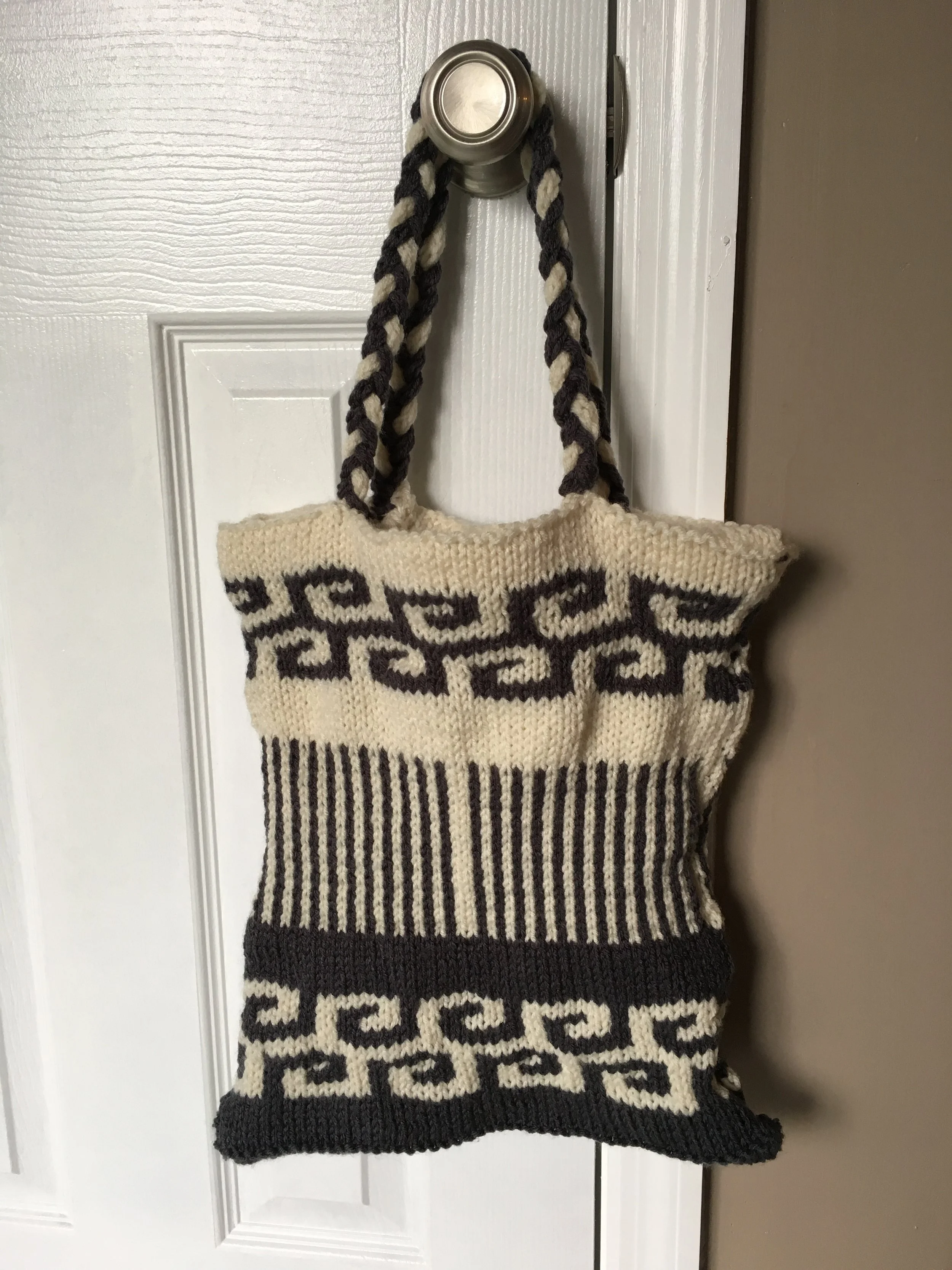 Swirls and Stripes Bag as published by Red Heart. The roomy size makes it a great tote!