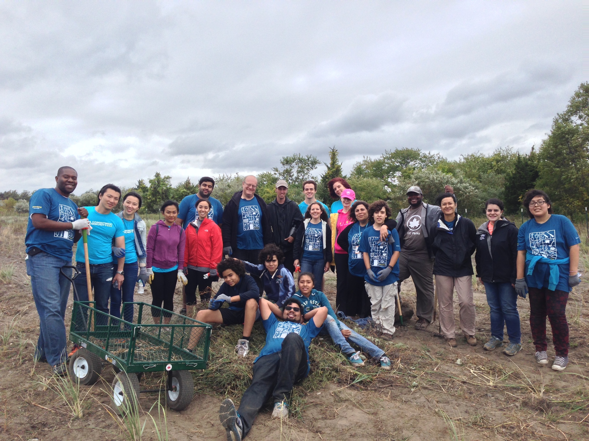  After a hard day's work of tending to an acre of the beach grass nursery at Floyd Bennett Field, volunteers smile for the camera. 